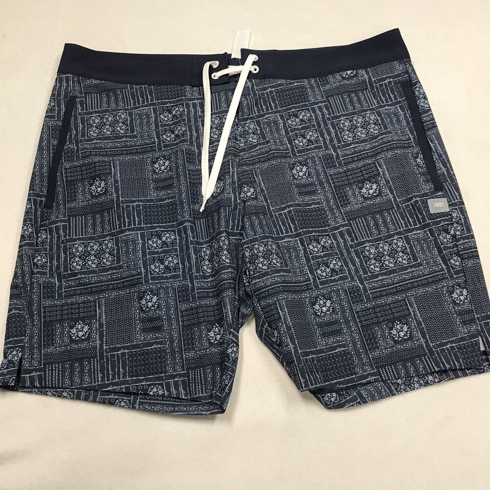 RHONE R&R Swim Trunks Men 38 Blue Floral Print Poly Stretch Mesh Lined